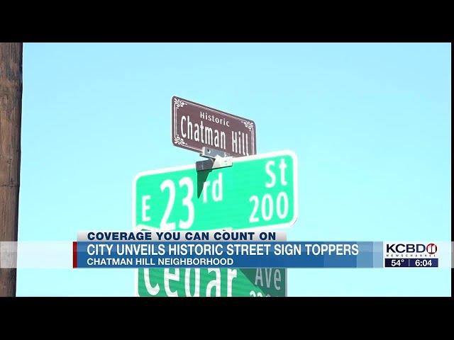 City unveils street sign toppers for Chatman Hill neighborhood