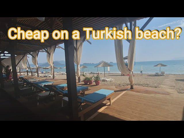 Cheap prices on a Turkish beach, Possible? . Let us see if we can find a beach that's cheap 