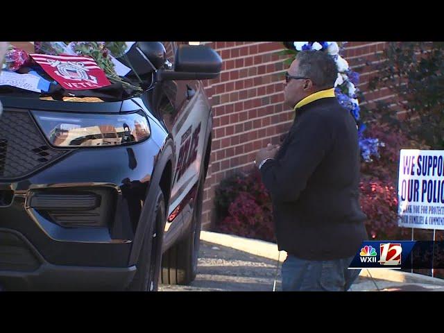 Residents, city leaders visit growing memorial for fallen Greensboro police officer