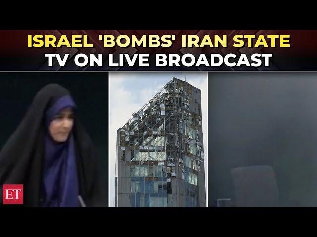 Watch moment Israeli missiles hit Iran’s state TV live on air, anchor flees as studio 'explodes'