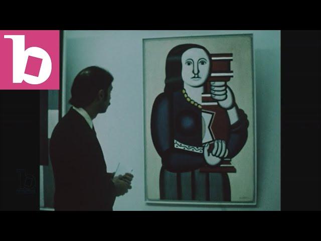 Man looks at Picasso painting of woman at the Guggenheim Museum of art on Fifth Avenue, New York, 19