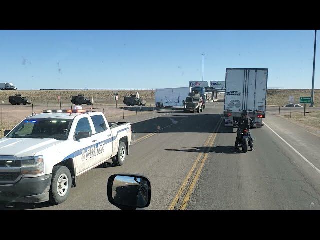 Trucker Escorted By Heavy Military Convoy