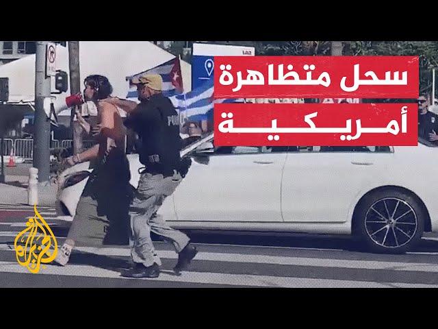 شاهد | لحظة اقتحام ناشطة أمريكية موكب الرئيس بايدن