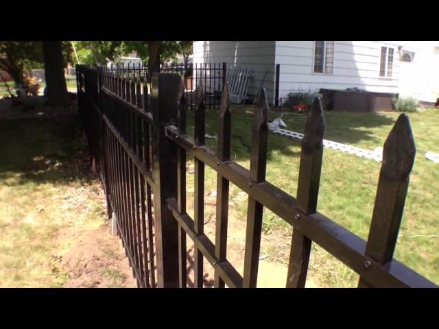 An ornamental fence can provide a subtle look to a big yard