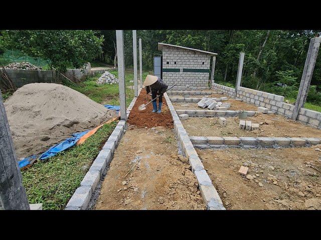 build brick walls, pour soil, level the breeding pig pen