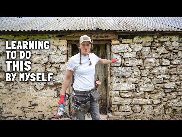 Traditional hot lime - repointing rubble stone house in Ireland.