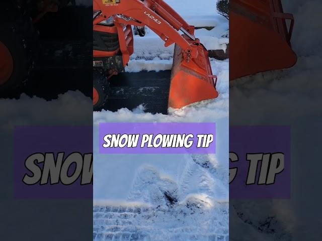 Pushing Snow with front bucket