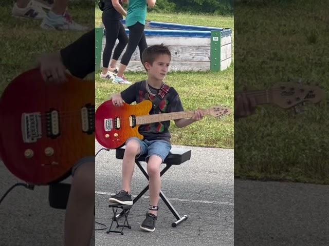 3rd grade talent show - Playing Seven Nation Army by White Stripes solo on the guitar