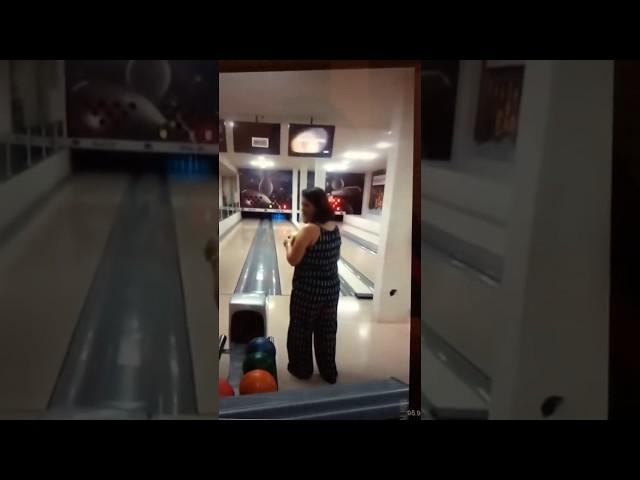 Lady throws bowling ball and SMASHES tv monitor