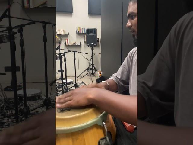 Multi-percussionist Dhina slaying it on the congas at River Records Studios