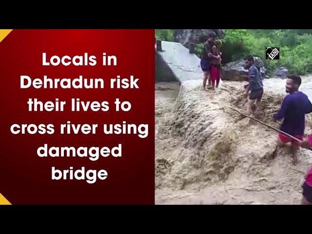 Locals in Dehradun risk their lives to cross river using damaged bridge