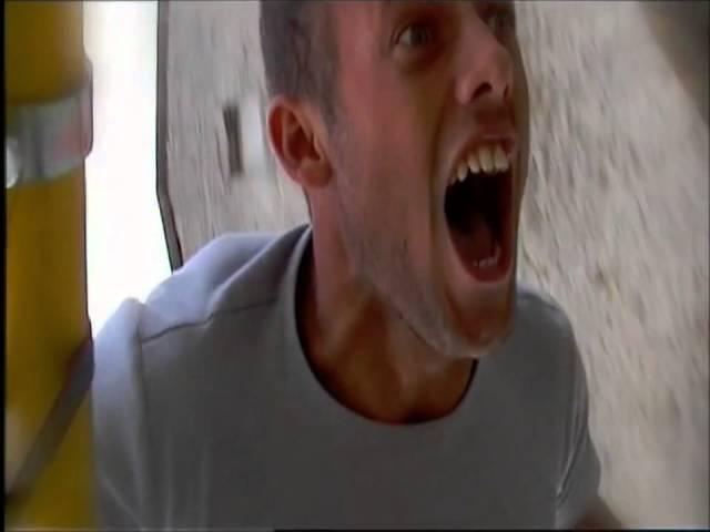 Guy screams on kiiking swing