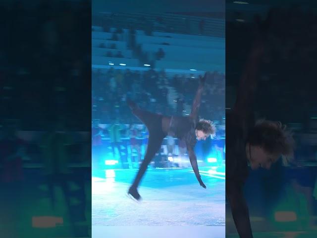 Ilia Malinin jumps his Quad Axel under the Olympic Rings