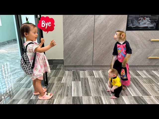 Diem kissed Monkey Kaka and Monkey Mit goodbye while going to school