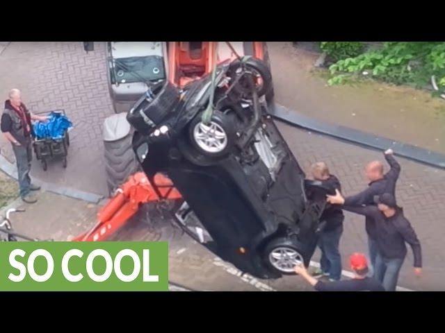 Smart car pulled from Amsterdam canal after "high-speed" chase