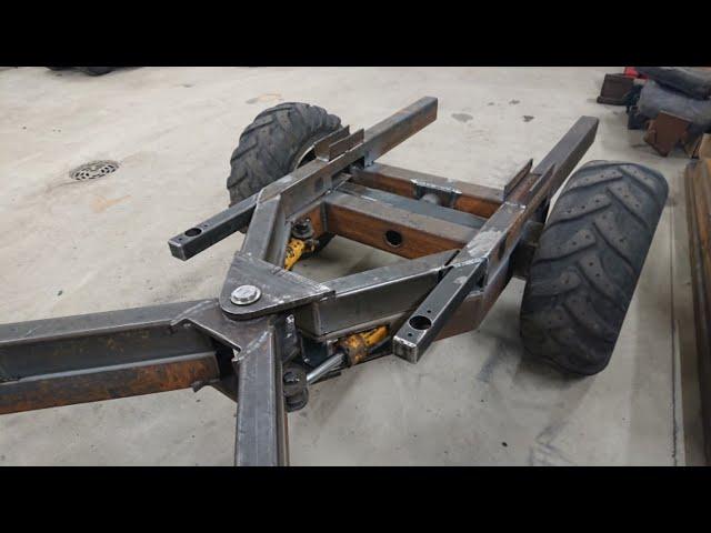 DIY wheel loader Episode 4. attaching steering cylinders and the cabin