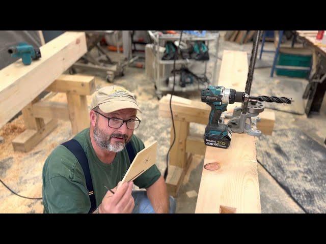 Timber Framing:  peg hole drilling for a perfect hole on both sides of the timber