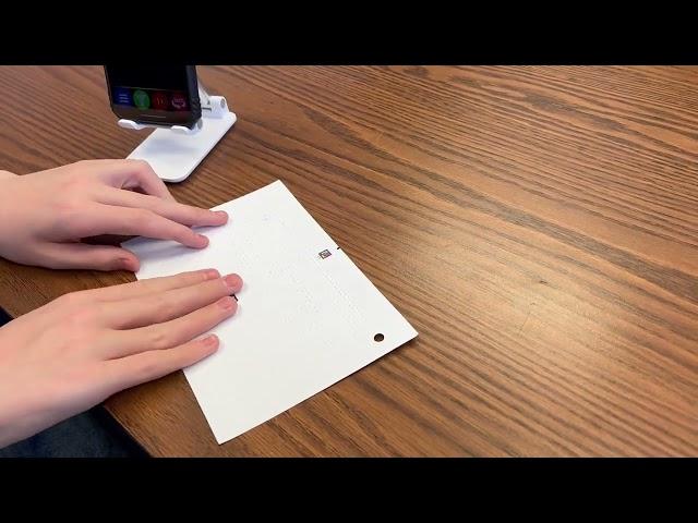 Demo - Student using Spanish braille flashcard with NaviLens code