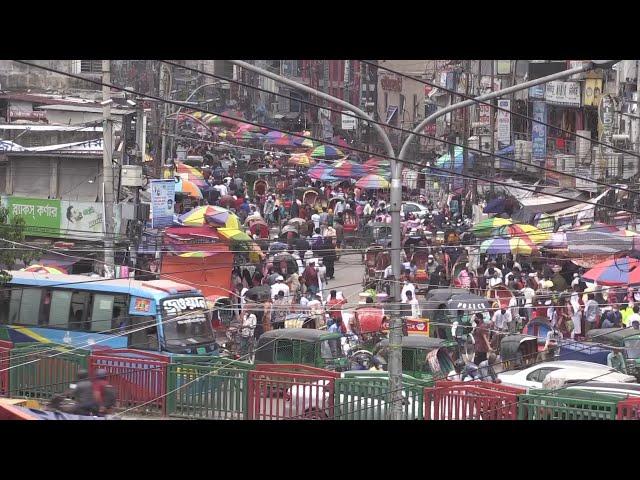 Crowds throng markets in Bangladesh ahead of Eid despite virus regulations | AFP