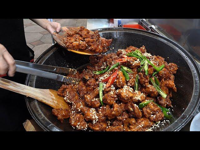 Korean fried chicken - spicy and sweet seasoned chicken, Korean street food