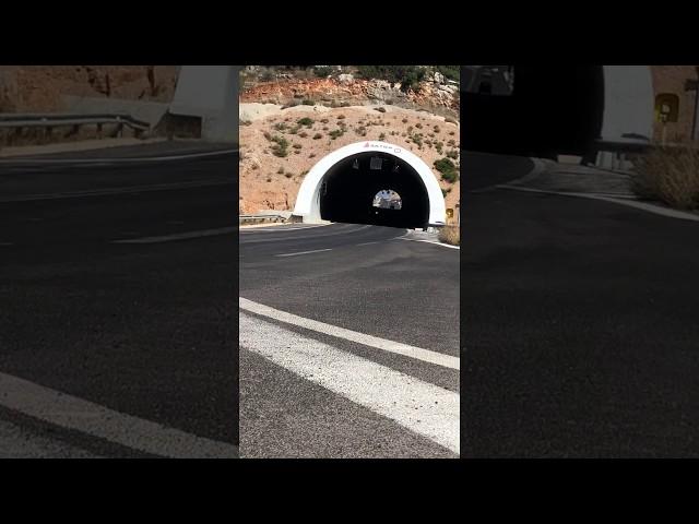 Ammoudara tunnel. First car lights off, second car lights on.