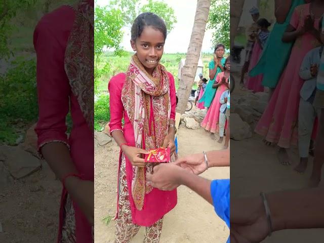 Thrilling Water Bucket Ball Challenge: Village Women Skillfully Drop Balls into Rotating Buckets