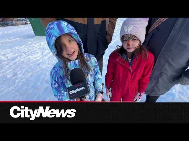 Families embrace winter activities at Calgary's Southwood Winter Fest amid cold weather