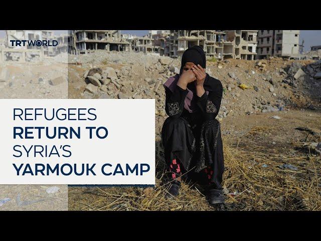 Displaced Syrians return to devastated Damascus refugee camp