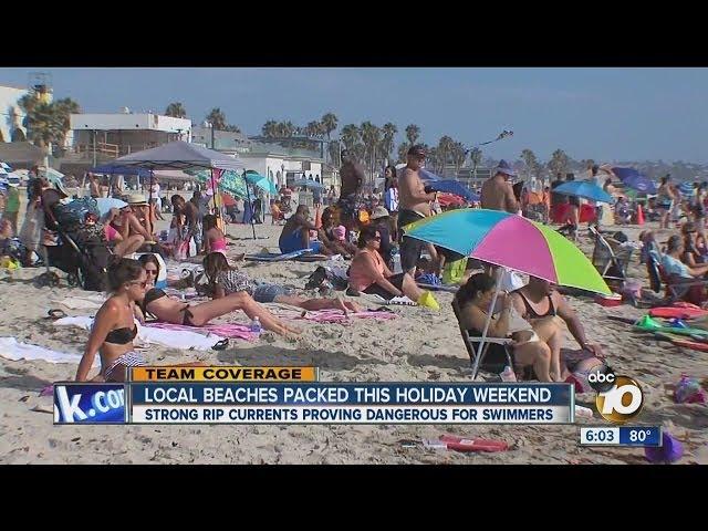 Crowds flock to local beaches for holiday weekend