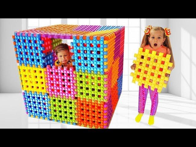 Diana and Roma Playing with Toy Blocks