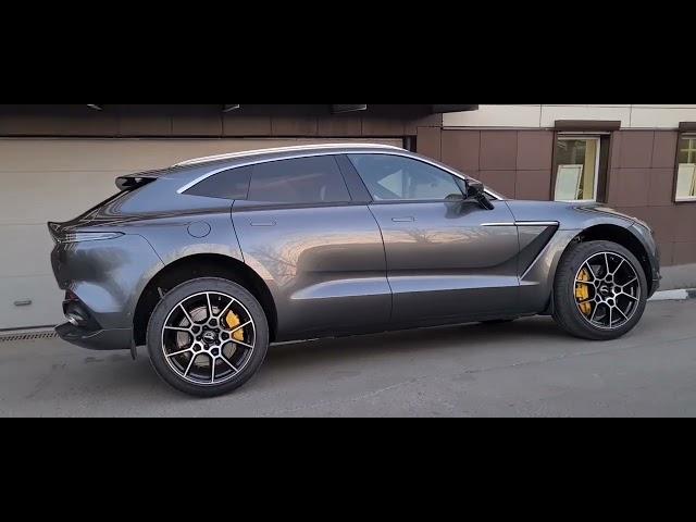 Как открыть капот у Aston Martin DBX?