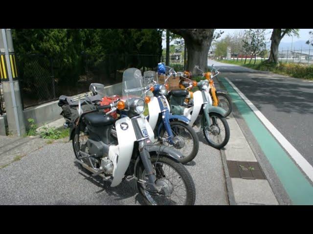 Riding an old Cub on the biggest lake in Japan.