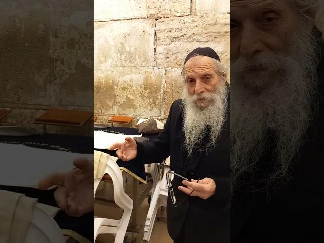 Rav Gutman Locks with R Elchanan Gabay write in S.Torah "MOSHIACH NOW" at t WesternWall in Jerusalem