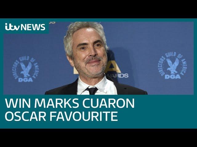 Roma director Alfonso Cuaron cements status as Oscar favourite with win at DGA Awards | ITV News