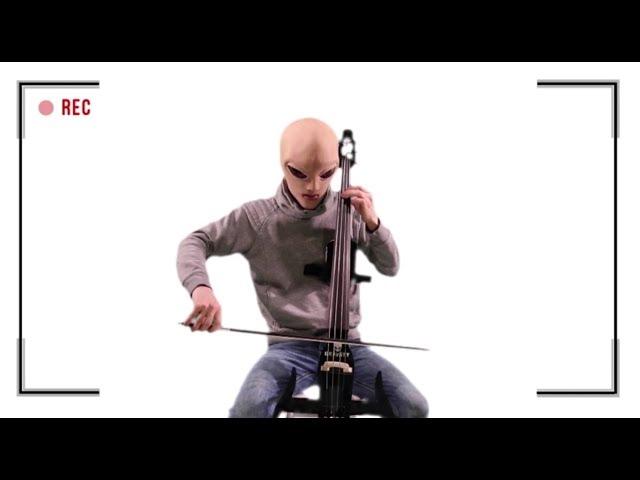 An alien playing Cello by GRAViiTY