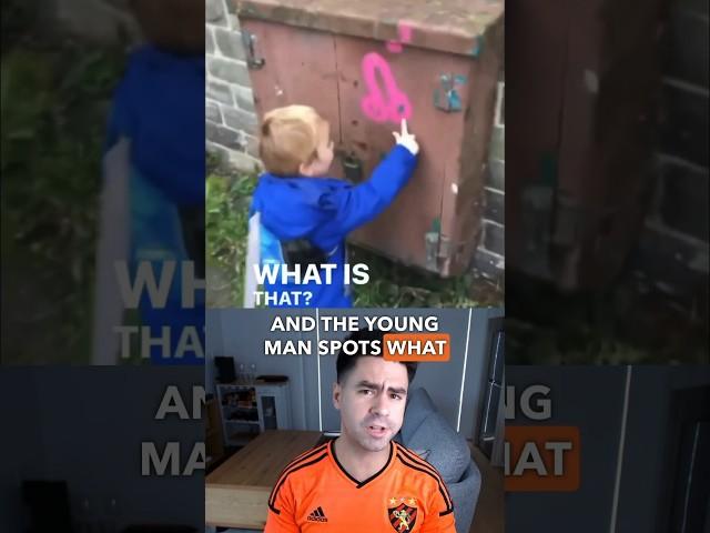 Kid confused by graffiti 