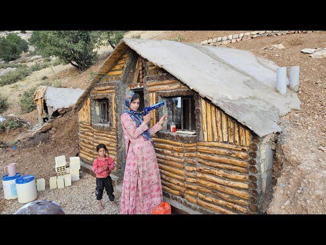 Nomadic mother installs glass in windows; shelter becomes brighter and warmer 🪟