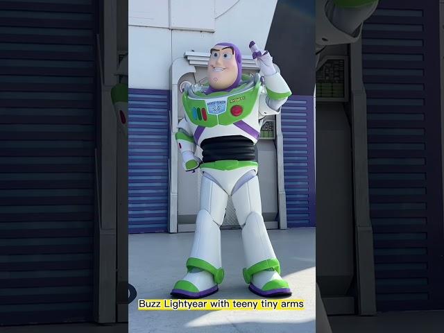 Why does Buzz Lightyear have tiny arms at Disney World?