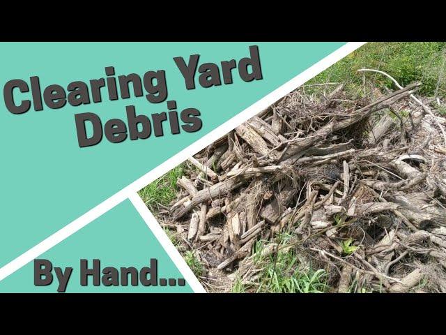 Clearing Yard Debris by Hand