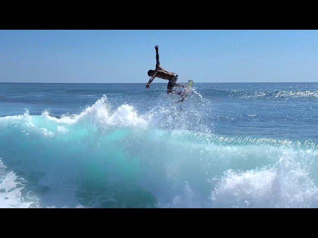 JET SKI TOWING SURFER IN LOW TIDE SESSION