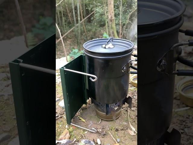 Brewing a cup of coffee in the forest is a delightful experience.