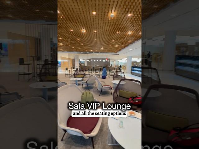 LOTS OF FOOD AND SEATING AT PRIORITY PASS SALA VIP LOUNGE - BARCELONA-EL PRAT INTERNATIONAL AIRPORT