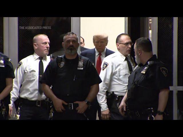 Trump, under arrest, appears in New York court