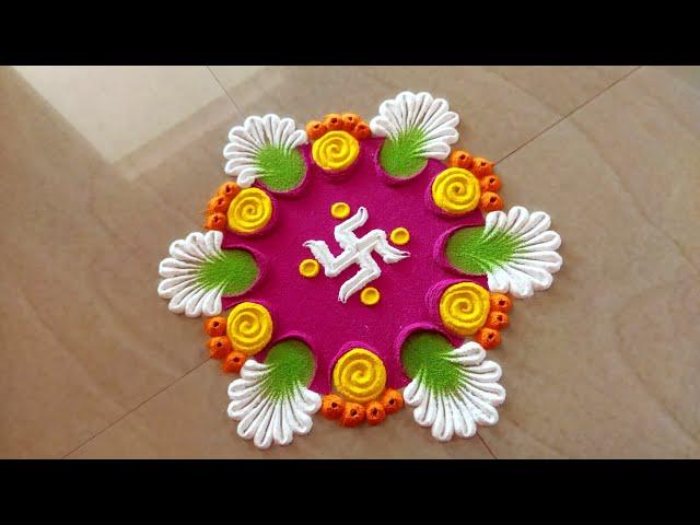 simple swastik rangoli design. Easy rangoli designs. unique rangoli design.