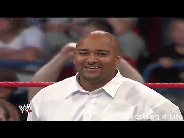 Hornswoggle Explode The Ring With A Detonator With Jonathan Coachman Underneath The Ring.