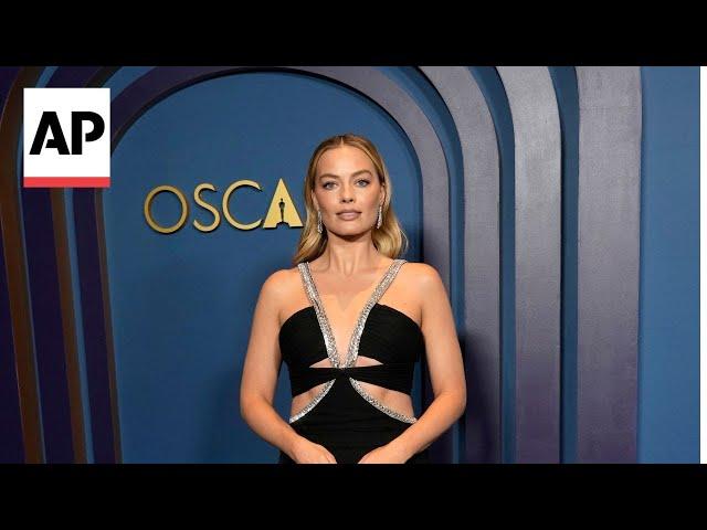 Margot Robbie, Emma Stone, Zac Efron at Governors Awards red carpet