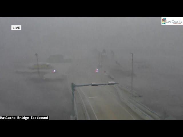 Hurricane Milton: Tornado sweeps over bridge during meteorologist's live report