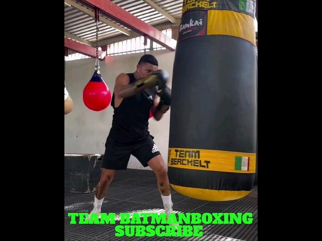 MIGUEL BERCHELT WORKING THE HEAVYBAG IN CAMP OR HIS NEXT FIGHT