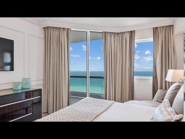 17875 Collins Ave #1404 - Raul Santidrian