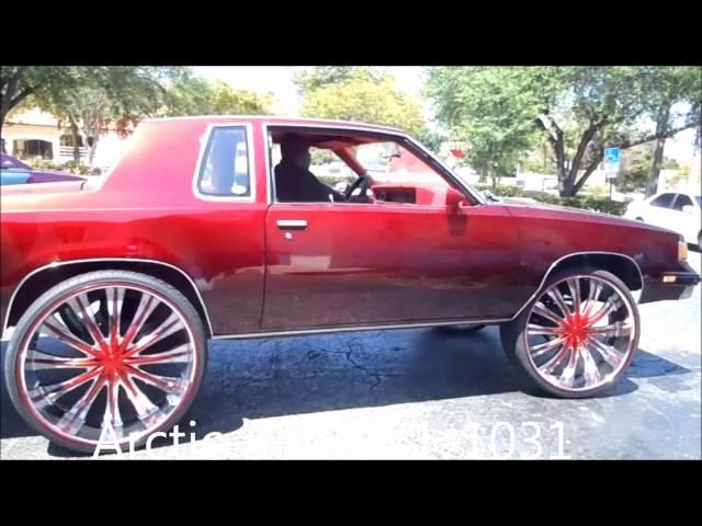 AceWhips.NET- ARCTIC Customs- Female's Candy Red Oldsmobile Cutlass on 28" Bentchis